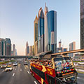 Uber Tours Bus infront of views in Dubai