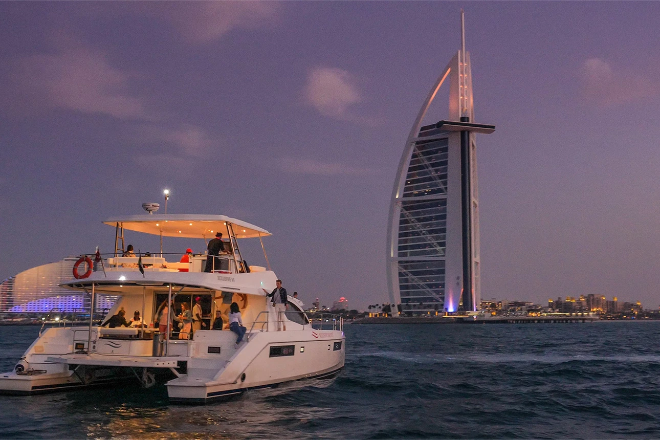 A luxury yacht sailing in the Dubai Marina.